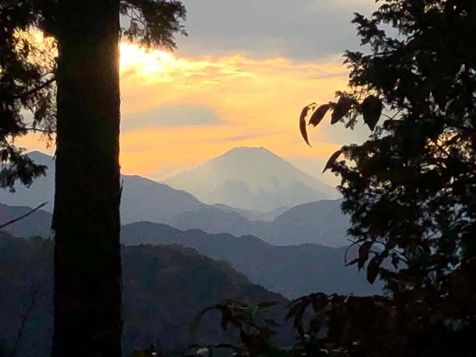 Sunrise over layered mountain ridges in Japan — the landscape that inspired The Public Bored founder while exploring entrepreneurship and startup culture abroad