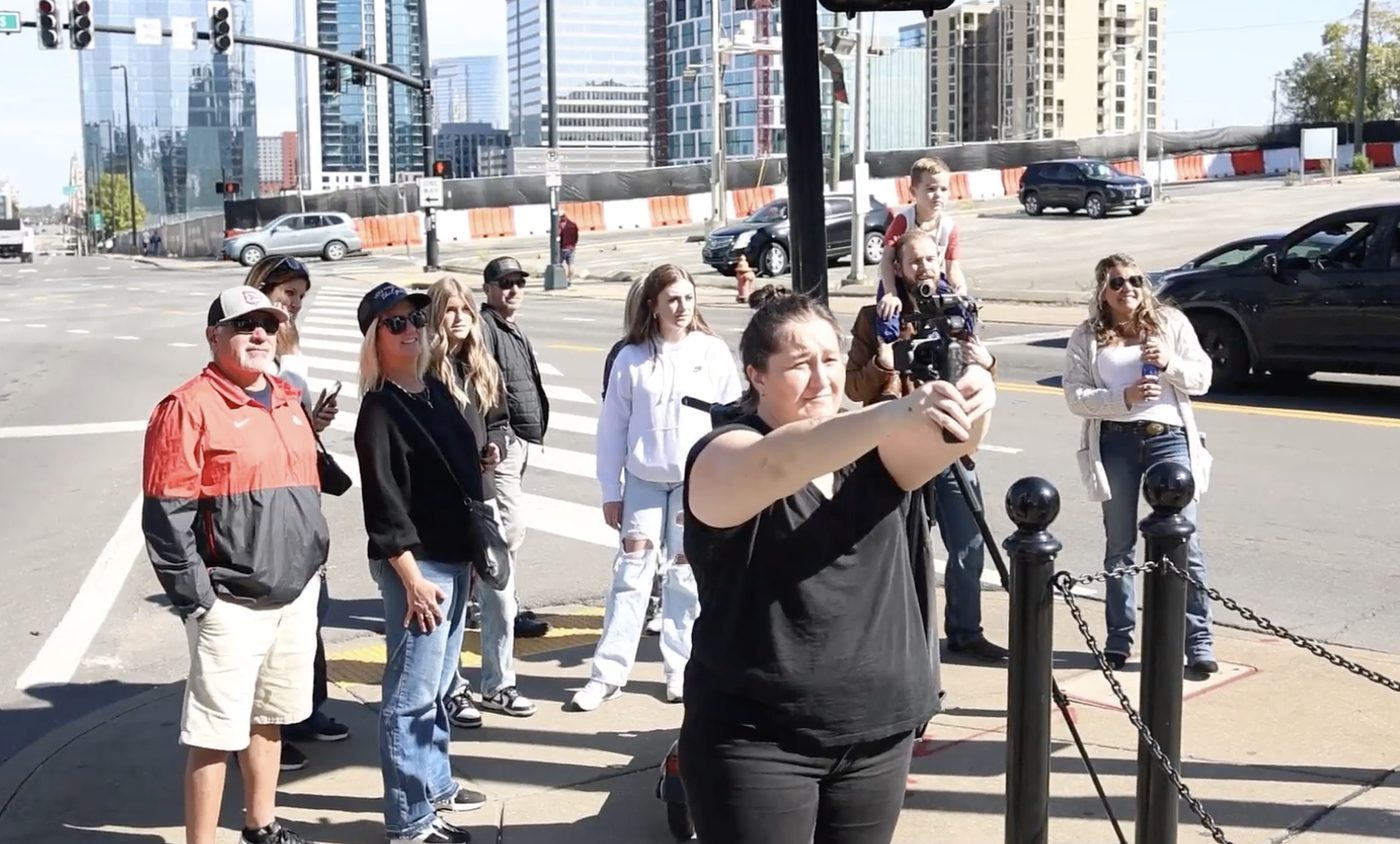 Supporters and crew gathered near the Nashville billboard activation.