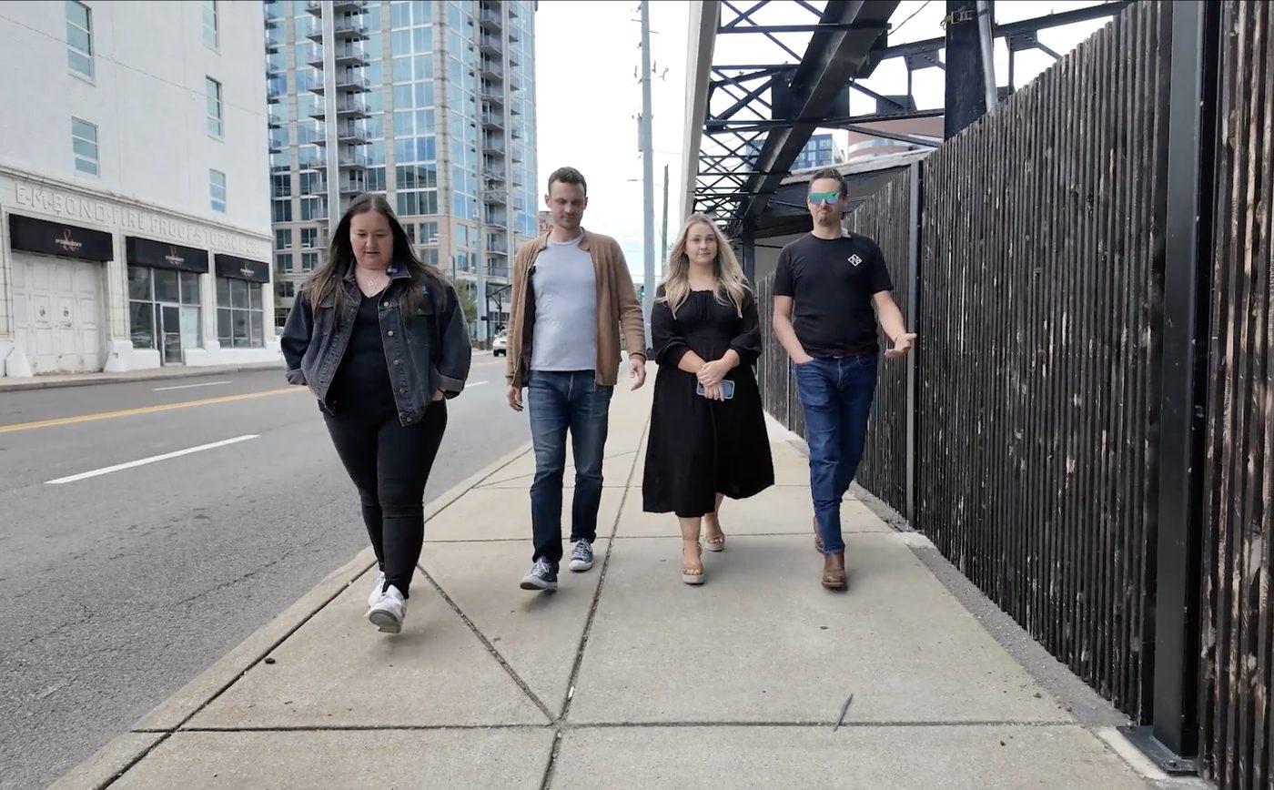 Breanna Nix walking with her team through downtown Nashville.